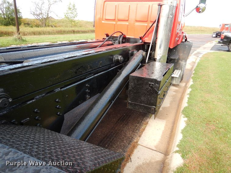 image for item AF9955 1999 Sterling L-Line  roll off container truck