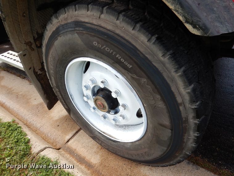 image for item AF9955 1999 Sterling L-Line  roll off container truck