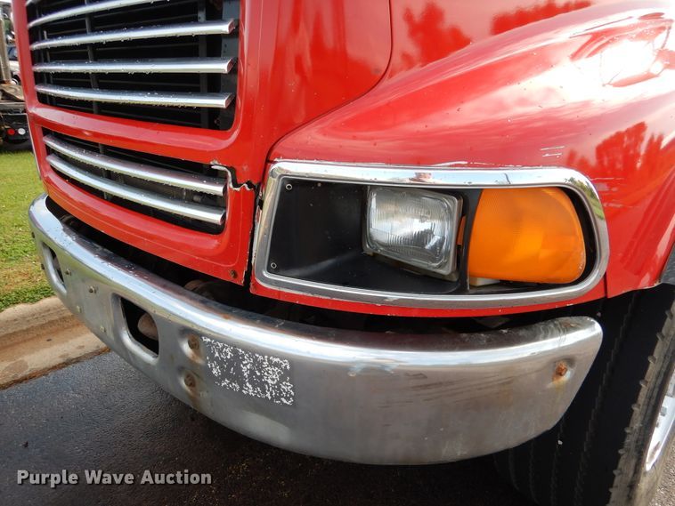 image for item AF9955 1999 Sterling L-Line  roll off container truck