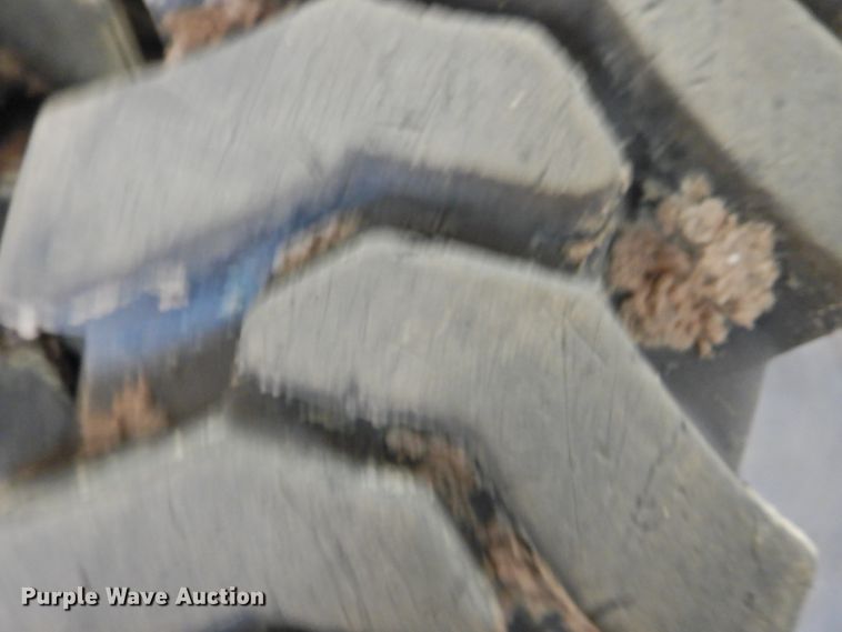 image for item HU9563 (4) 36x12-20 solid tires and wheels