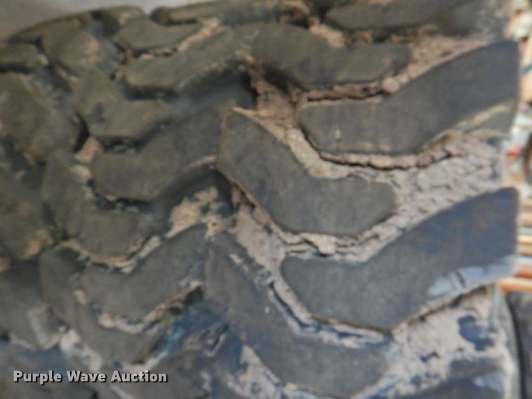 image for item HU9563 (4) 36x12-20 solid tires and wheels