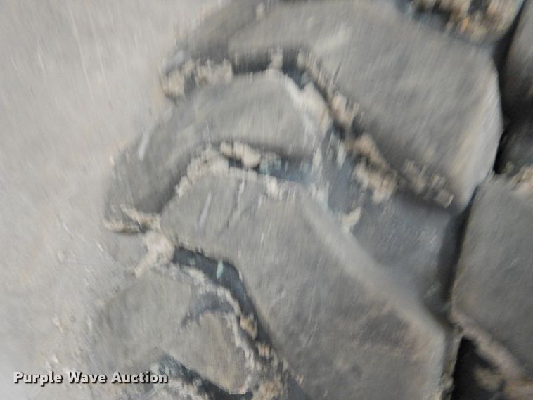 image for item HU9563 (4) 36x12-20 solid tires and wheels