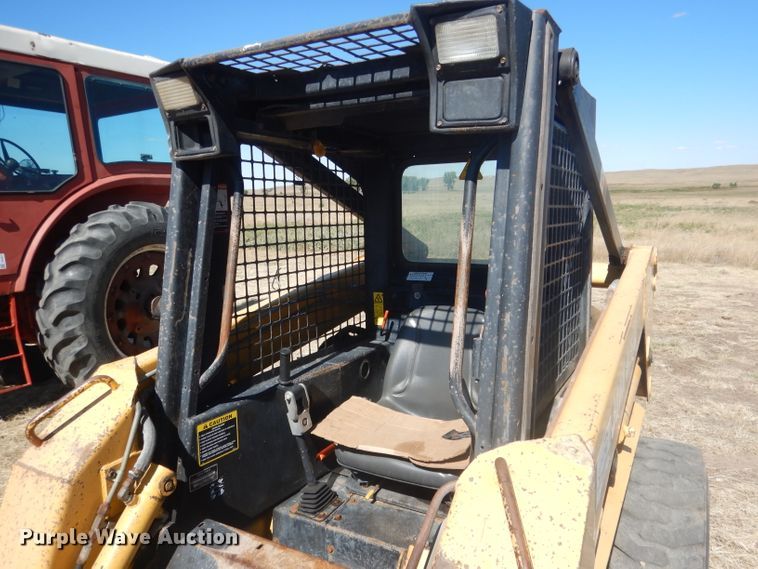image for item DG4618 1995 John Deere 7775  skid steer loader