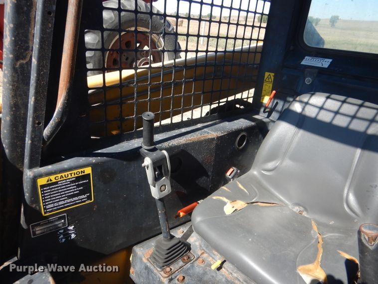 image for item DG4618 1995 John Deere 7775  skid steer loader