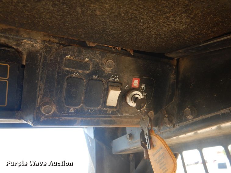 image for item DG4618 1995 John Deere 7775  skid steer loader