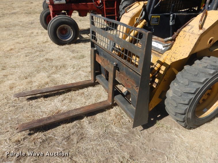 image for item DG4618 1995 John Deere 7775  skid steer loader