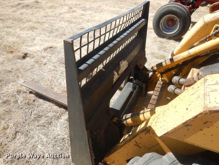 image for item DG4618 1995 John Deere 7775  skid steer loader