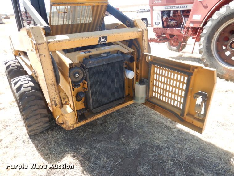 image for item DG4618 1995 John Deere 7775  skid steer loader