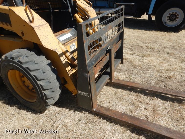 image for item DG4618 1995 John Deere 7775  skid steer loader