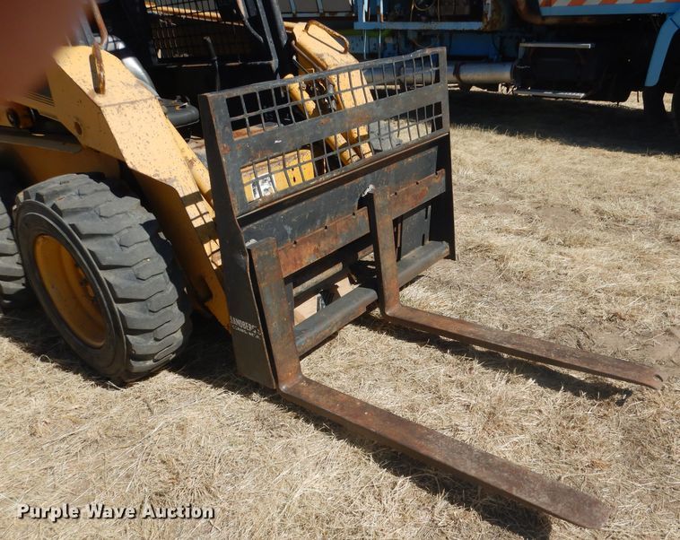 image for item DG4618 1995 John Deere 7775  skid steer loader