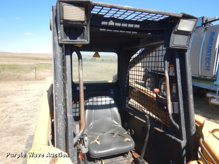 image for item DG4618 1995 John Deere 7775  skid steer loader