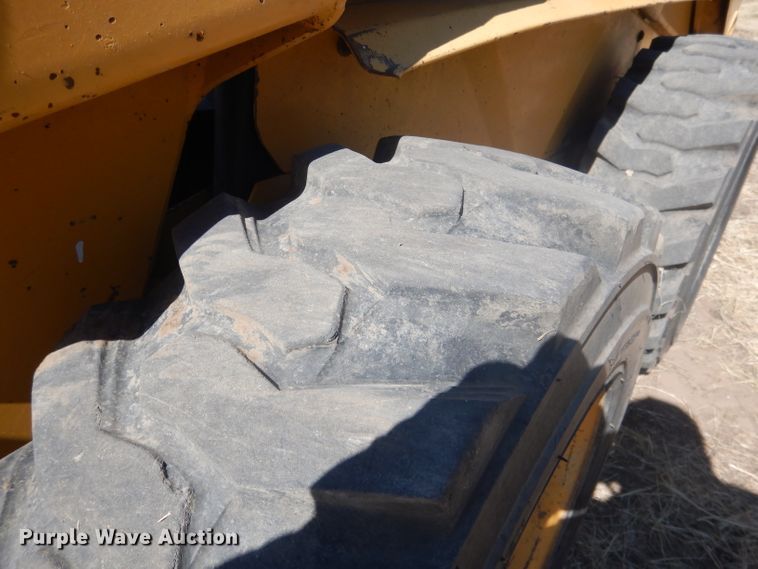 image for item DG4618 1995 John Deere 7775  skid steer loader