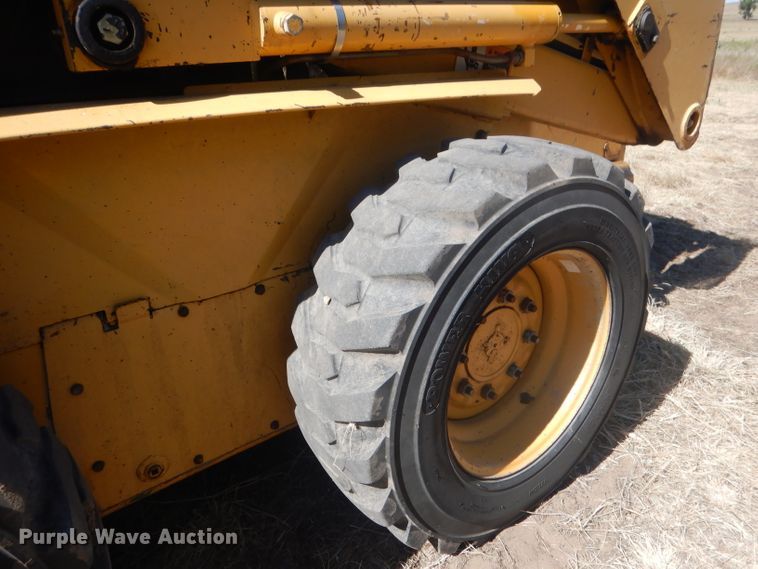 image for item DG4618 1995 John Deere 7775  skid steer loader