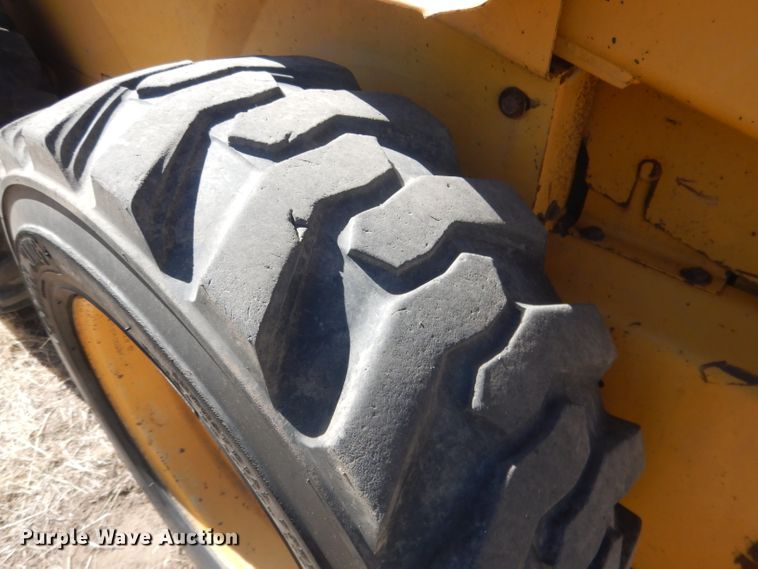 image for item DG4618 1995 John Deere 7775  skid steer loader