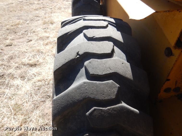 image for item DG4618 1995 John Deere 7775  skid steer loader