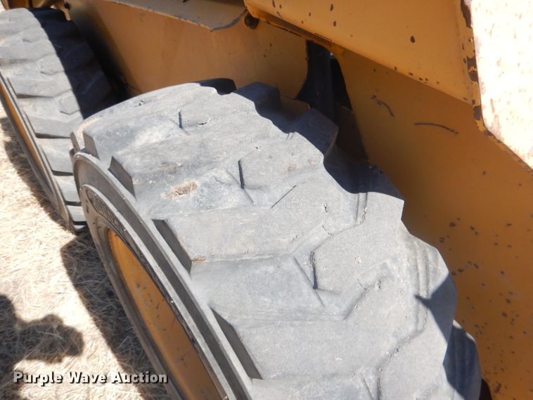 image for item DG4618 1995 John Deere 7775  skid steer loader