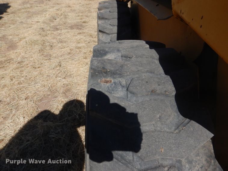 image for item DG4618 1995 John Deere 7775  skid steer loader