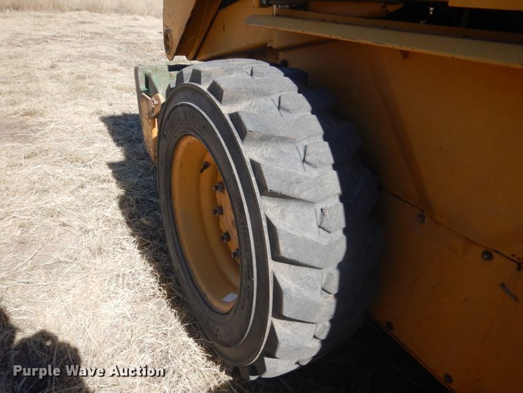 image for item DG4618 1995 John Deere 7775  skid steer loader