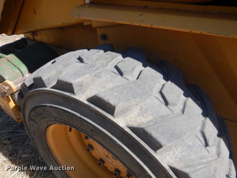 image for item DG4618 1995 John Deere 7775  skid steer loader