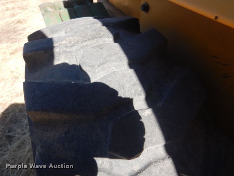 image for item DG4618 1995 John Deere 7775  skid steer loader