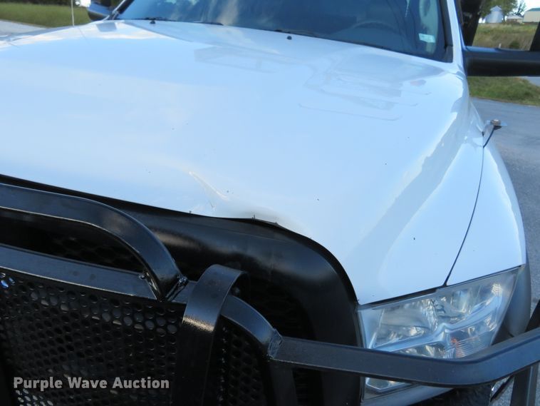 image for item DH1245 2014 Dodge Ram 5500HD  Crew Cab flatbed truck