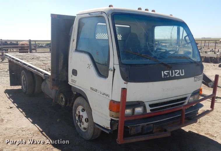 image for item HO9187 1995 Isuzu NPR  flatbed truck