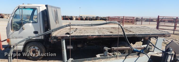 image for item HO9187 1995 Isuzu NPR  flatbed truck