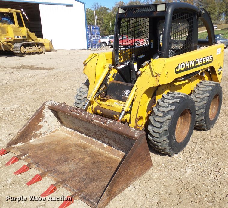image for item DC2917 1999 John Deere 250  skid steer loader