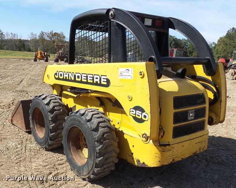 image for item DC2917 1999 John Deere 250  skid steer loader