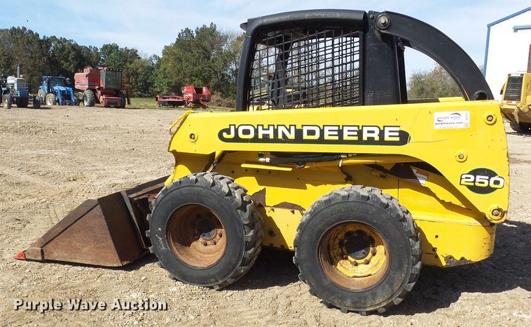 image for item DC2917 1999 John Deere 250  skid steer loader