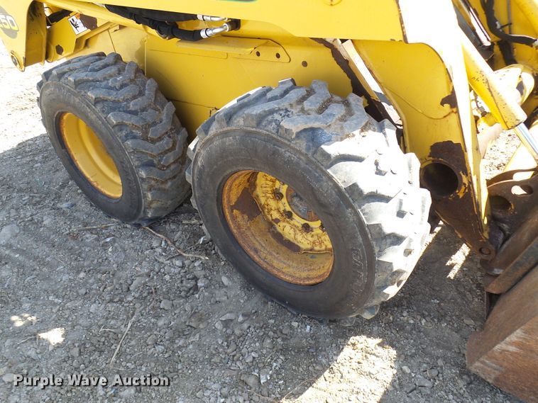 image for item DC2917 1999 John Deere 250  skid steer loader