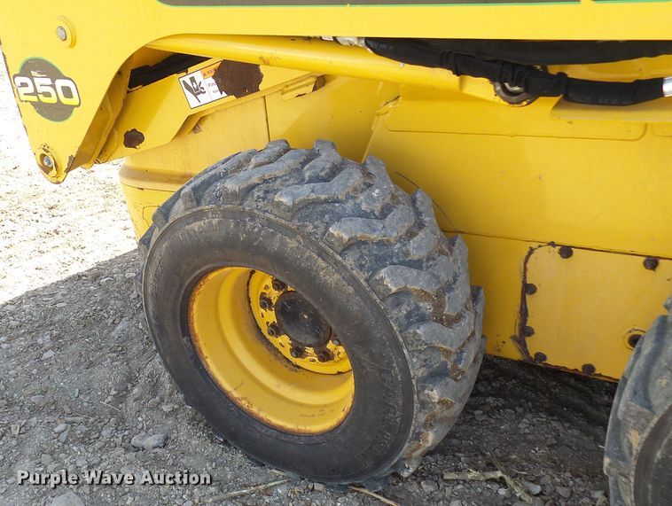 image for item DC2917 1999 John Deere 250  skid steer loader