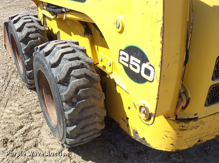 image for item DC2917 1999 John Deere 250  skid steer loader