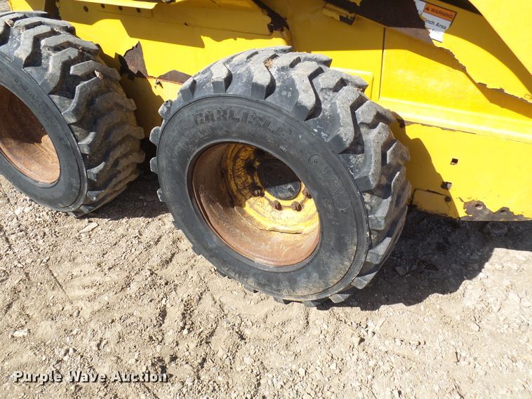image for item DC2917 1999 John Deere 250  skid steer loader