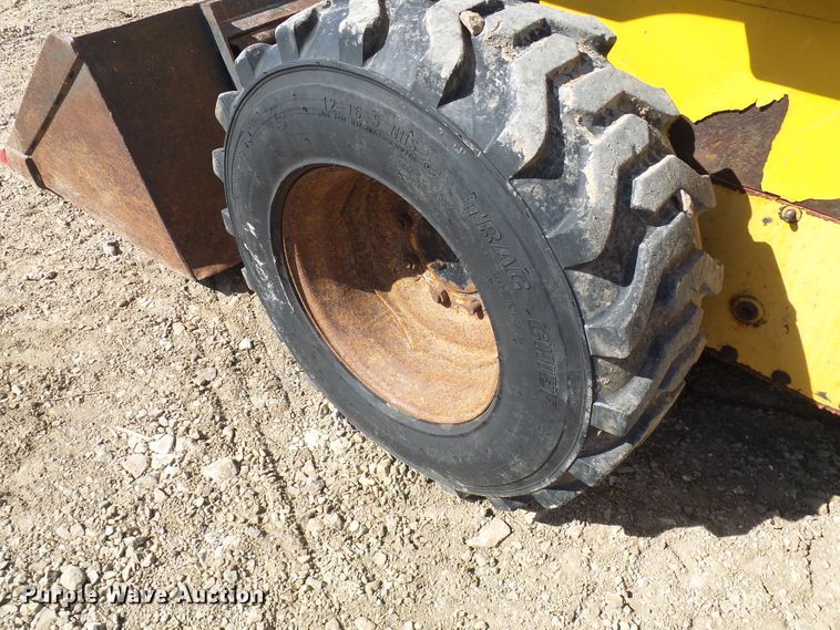 image for item DC2917 1999 John Deere 250  skid steer loader