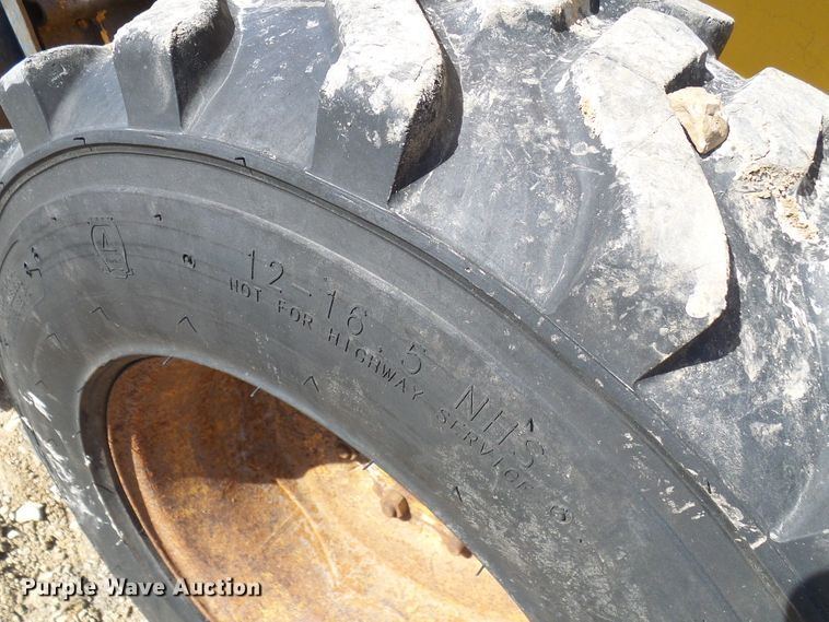 image for item DC2917 1999 John Deere 250  skid steer loader