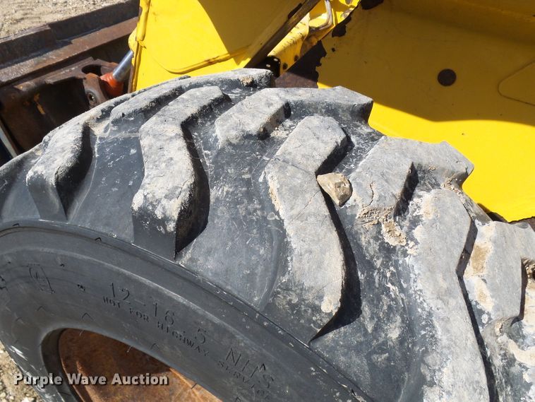 image for item DC2917 1999 John Deere 250  skid steer loader