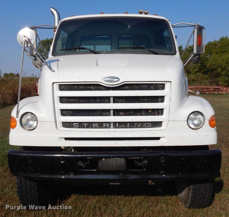 image for item HN9359 2002 Sterling L-Line  flatbed truck