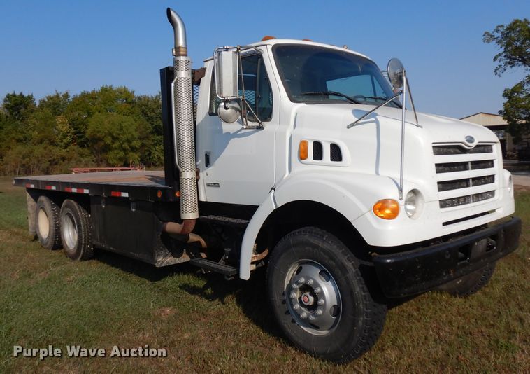 image for item HN9359 2002 Sterling L-Line  flatbed truck