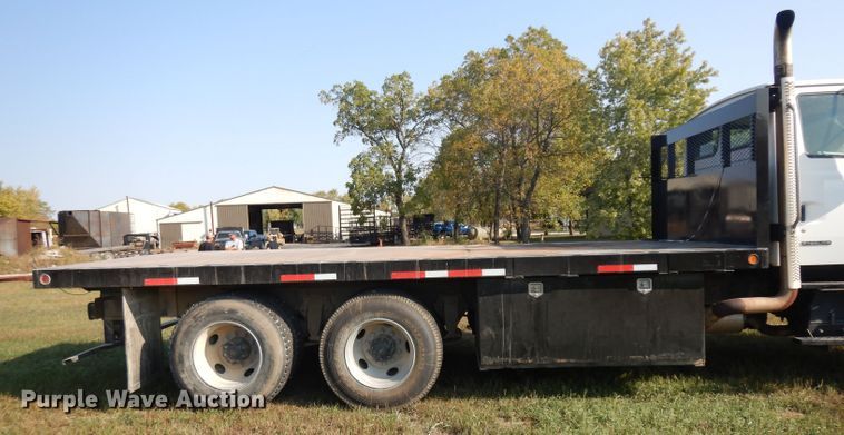 image for item HN9359 2002 Sterling L-Line  flatbed truck