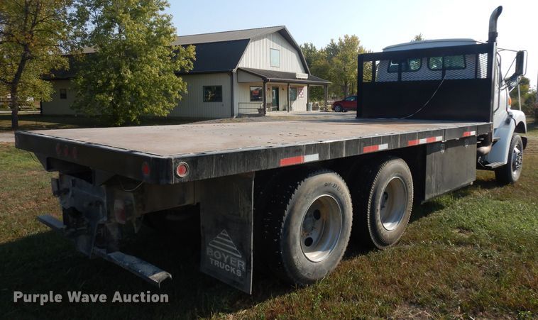 image for item HN9359 2002 Sterling L-Line  flatbed truck