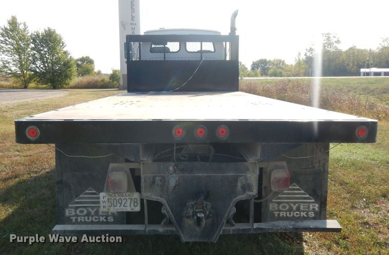 image for item HN9359 2002 Sterling L-Line  flatbed truck