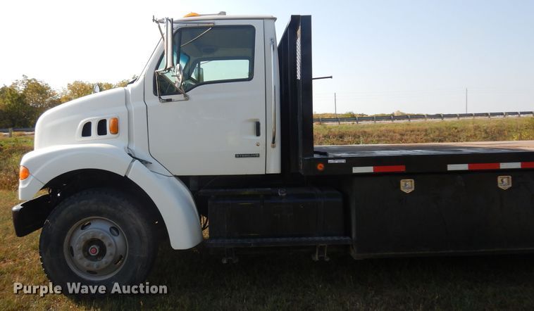 image for item HN9359 2002 Sterling L-Line  flatbed truck
