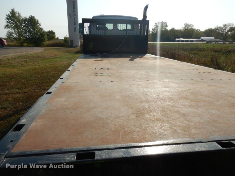 image for item HN9359 2002 Sterling L-Line  flatbed truck