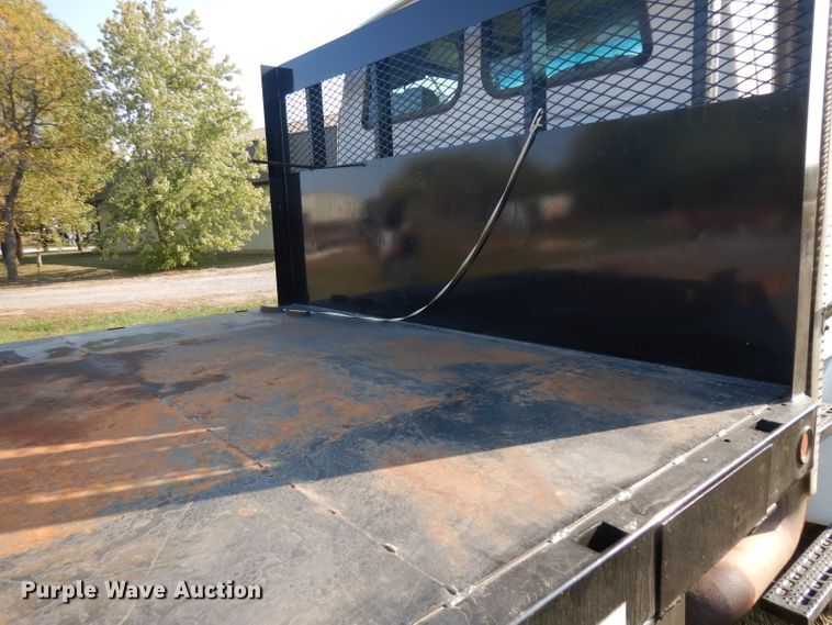 image for item HN9359 2002 Sterling L-Line  flatbed truck