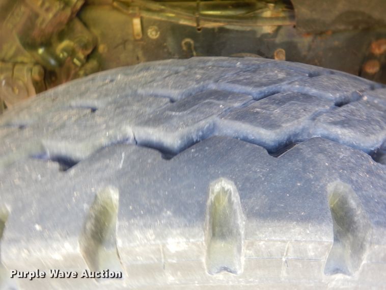 image for item HN9359 2002 Sterling L-Line  flatbed truck