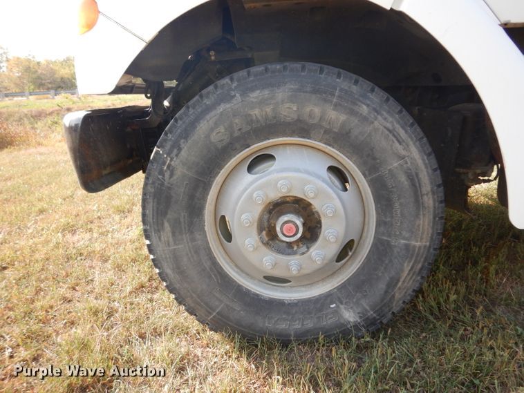 image for item HN9359 2002 Sterling L-Line  flatbed truck