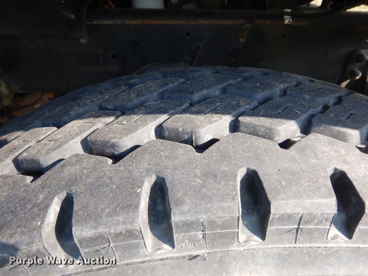 image for item HN9359 2002 Sterling L-Line  flatbed truck