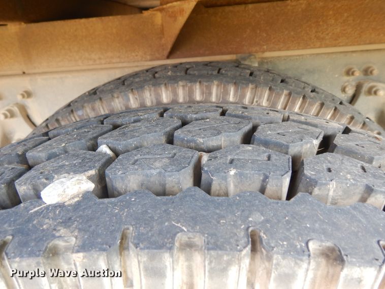 image for item HN9359 2002 Sterling L-Line  flatbed truck