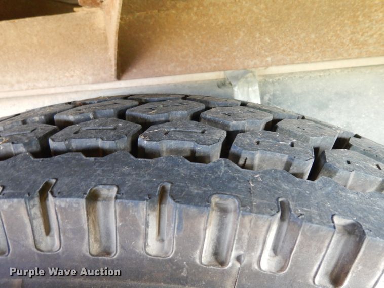 image for item HN9359 2002 Sterling L-Line  flatbed truck